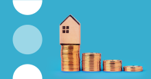 Blue banner with image of stacked coins